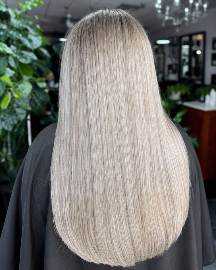 Long platinum blonde, blunt and glossy